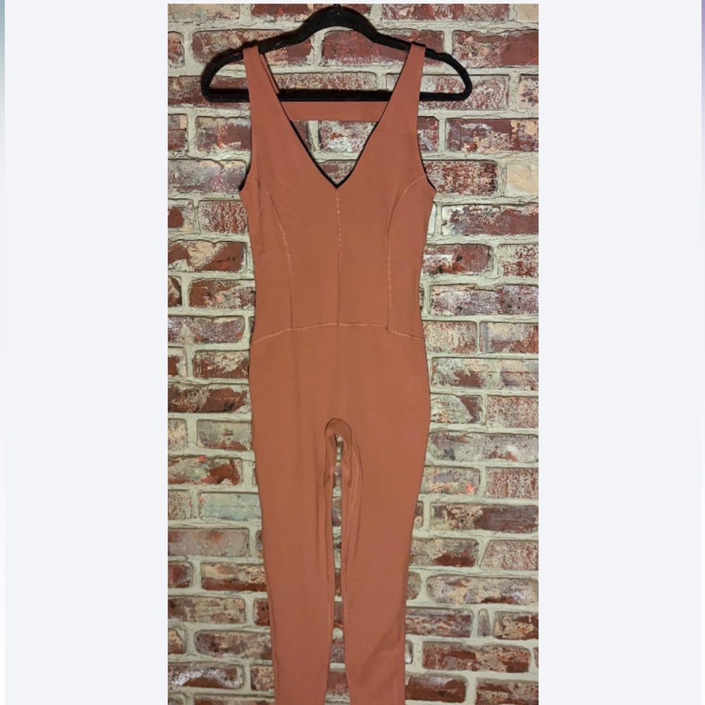 Sold - Similar Items in Closet!
FP Movement Never Better Jumpsuit Rust Size S